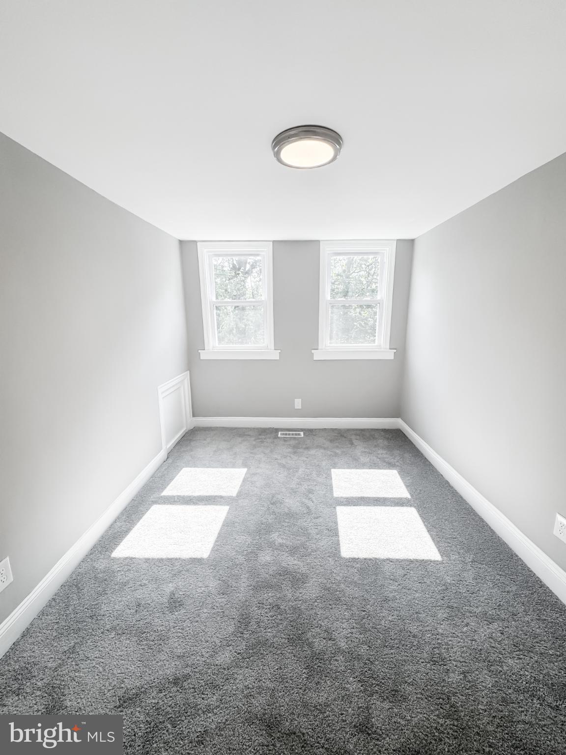 4105 30th Street Mount Rainier, MD 20712 - Photo 49 of 98 an empty room with windows