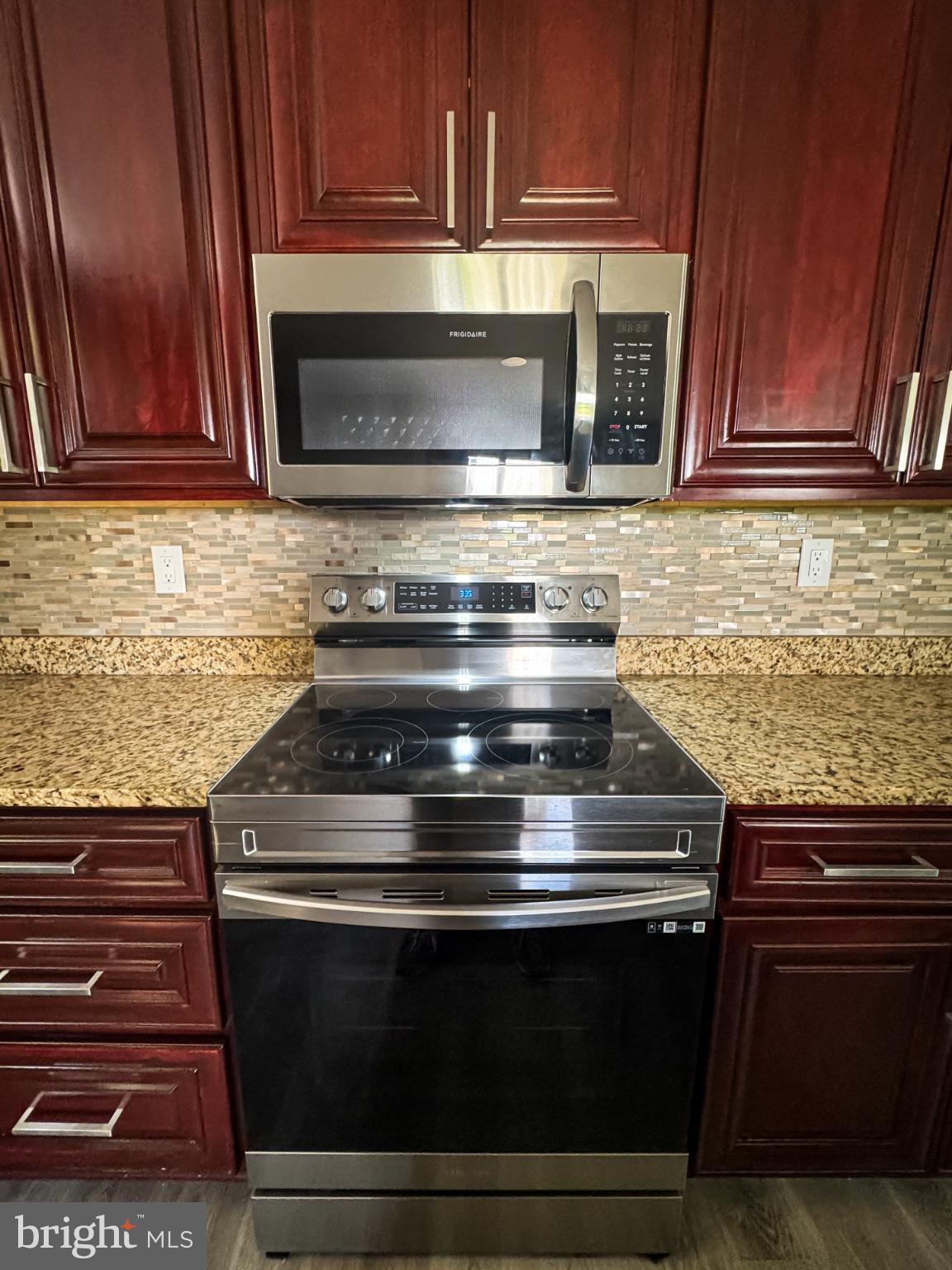 4105 30th Street Mount Rainier, MD 20712 - Photo 79 of 98 a stove top oven sitting inside of a kitchen