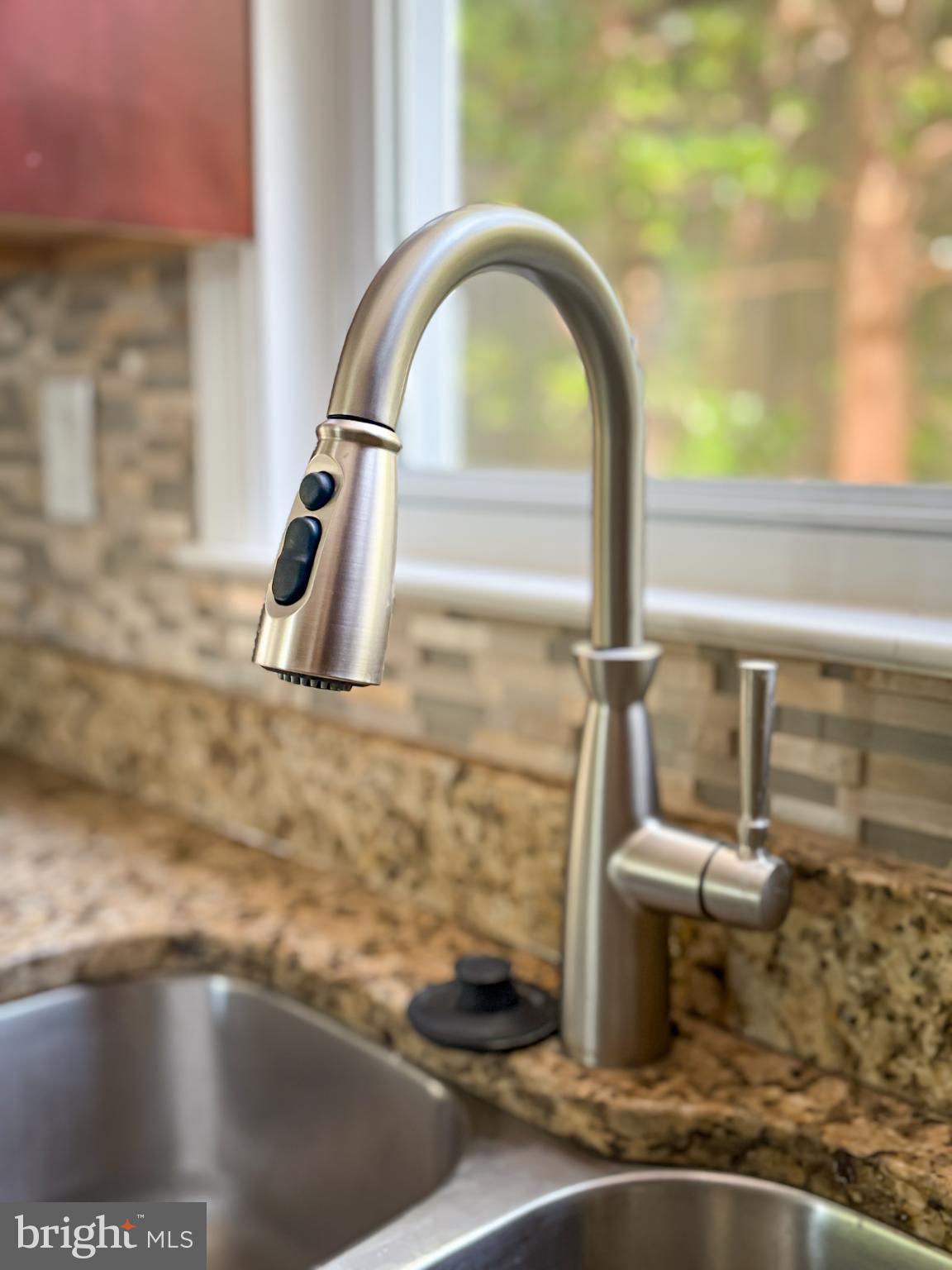 4105 30th Street Mount Rainier, MD 20712 - Photo 80 of 98 Sleek kitchen faucet with modern design.