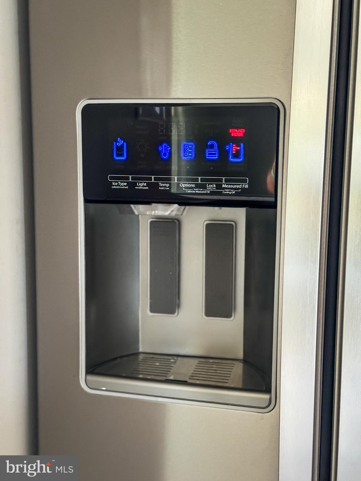 4105 30th Street Mount Rainier, MD 20712 - Photo 84 of 98 Sleek fridge with modern water dispenser.