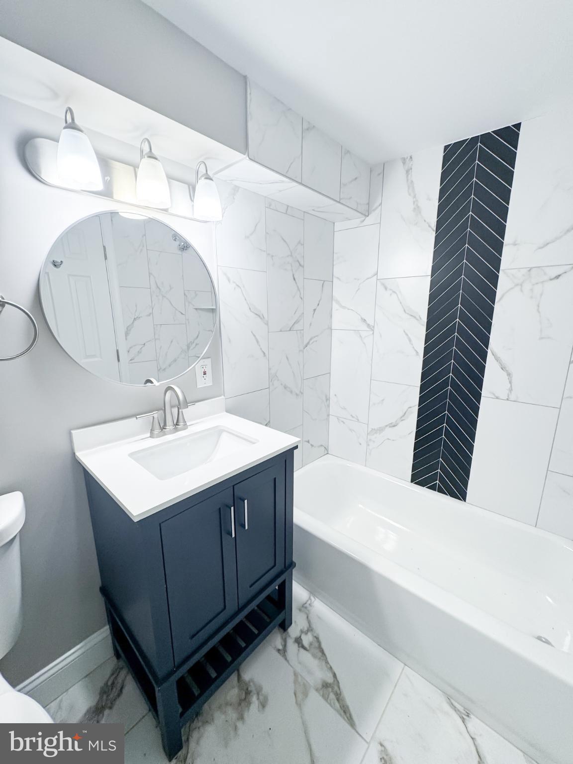 4105 30th Street Mount Rainier, MD 20712 - Photo 86 of 98 Sleek modern bathroom with elegant finishes.