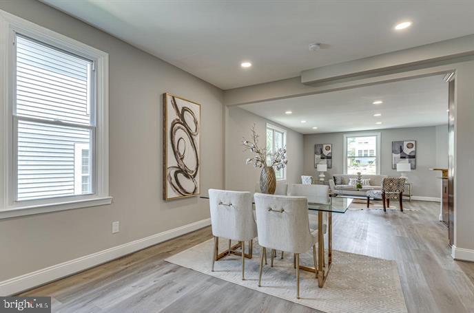 4105 30th Street Mount Rainier, MD 20712 - Photo 10 of 98 a view of a a dining room with furniture window and wooden floor