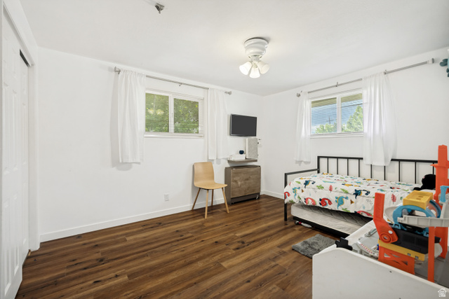 1215 8th Street Ogden, UT 84404 - Photo 16 of 39 Bright room featuring wood-finish flooring, white walls, and a ceiling fan
