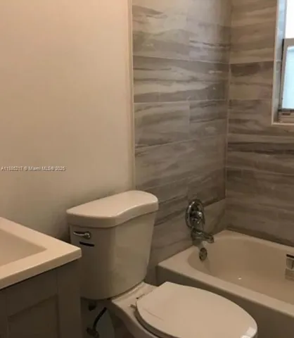 a bathroom with bathtub