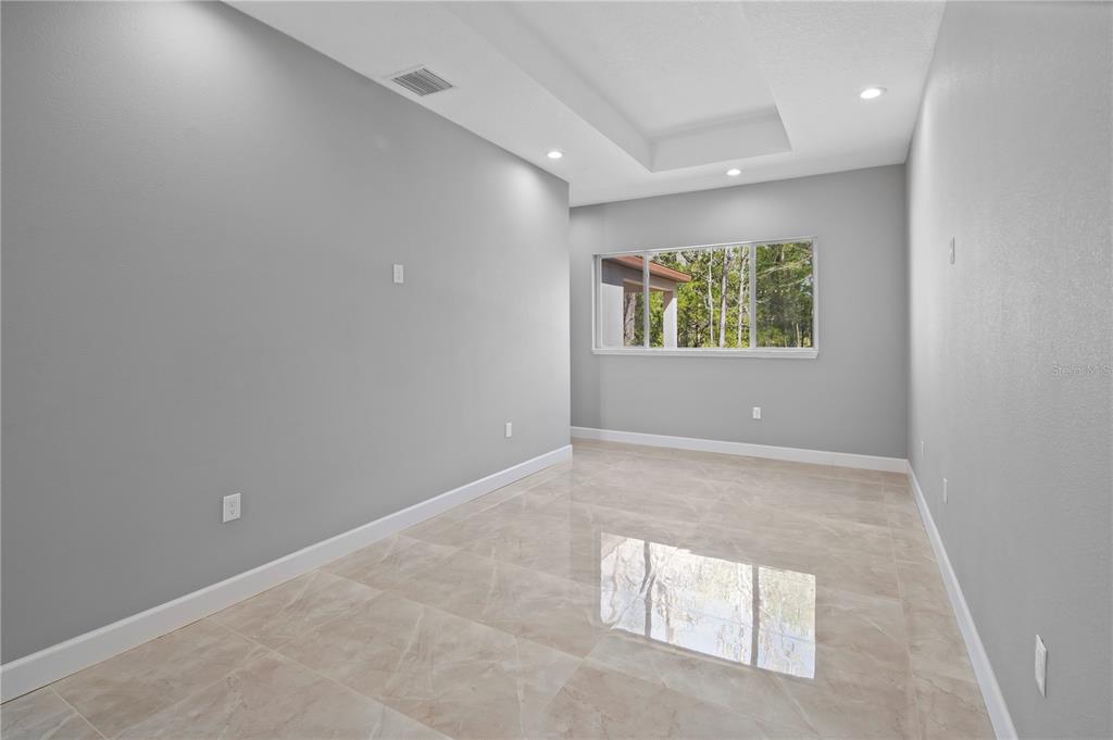 4869 Northwest 101st St Road Ocala, FL 34482 - Photo 7 of 48 formal living room