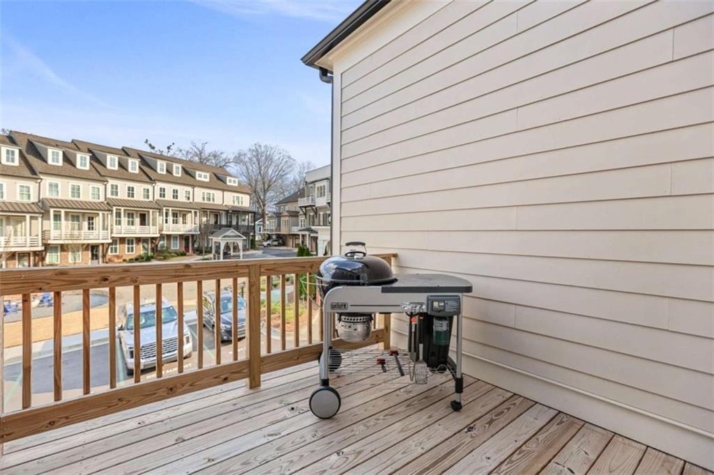 4466 Lemon Street Acworth, GA 30101 - Photo 50 of 65 a view of balcony with wooden floor and outdoor seating