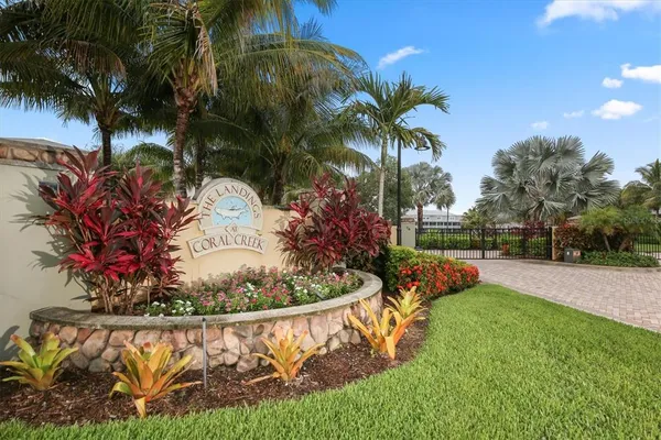 an aerial view of a house with a lake view