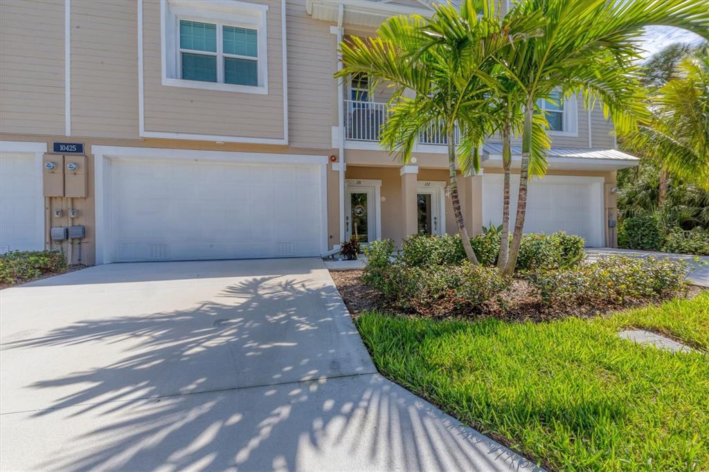 10425 Pilothouse Circle, Unit 130 Placida, FL 33946 - Photo 17 of 76 a front view of a house with a garden