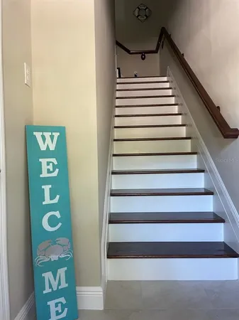 a bathroom with a bathtub and a window