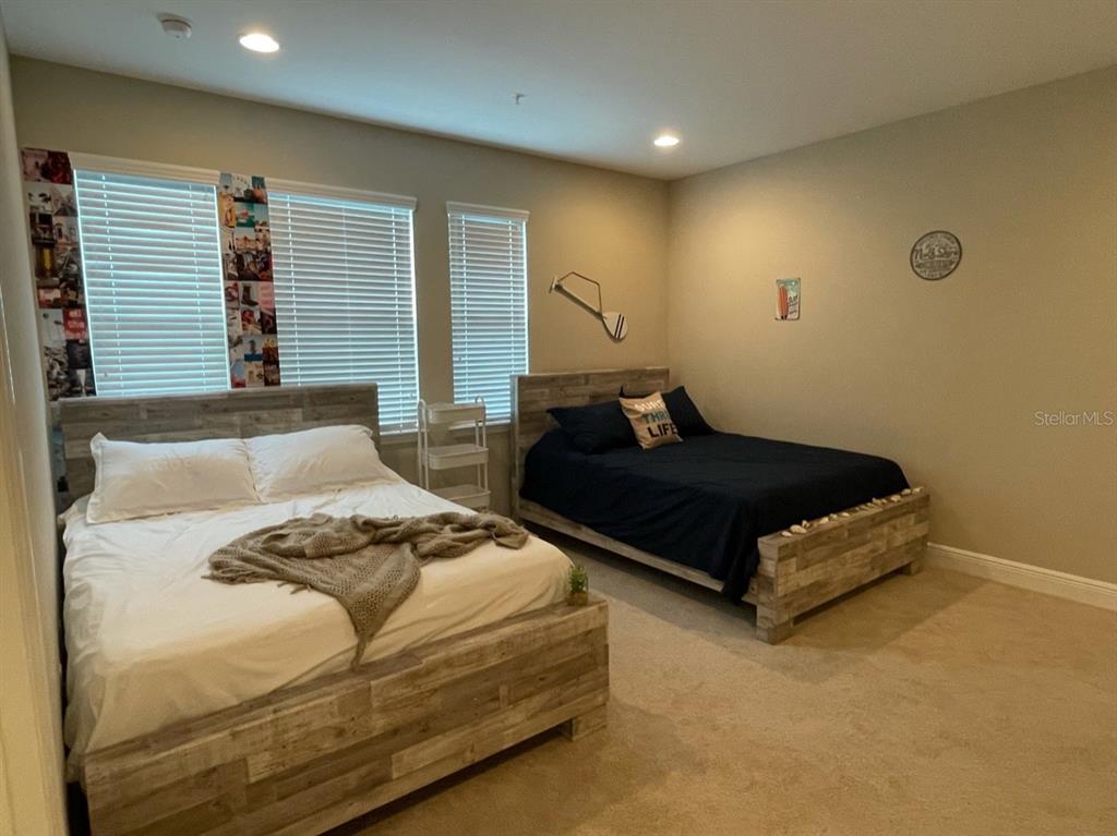 10425 Pilothouse Circle, Unit 130 Placida, FL 33946 - Photo 37 of 76 a bedroom with a bed and window