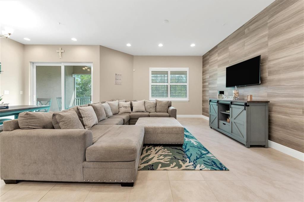 10425 Pilothouse Circle, Unit 130 Placida, FL 33946 - Photo 42 of 76 a living room with furniture and a flat screen tv