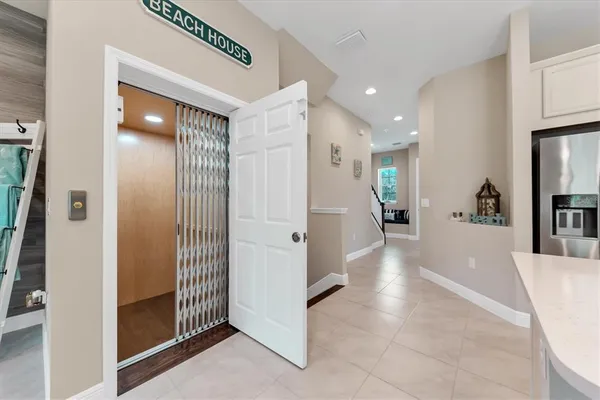 a view of a swimming pool and lounge chair