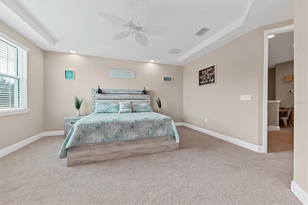 10425 Pilothouse Circle, Unit 130 Placida, FL 33946 - Photo 53 of 76 a bedroom with a bed and window