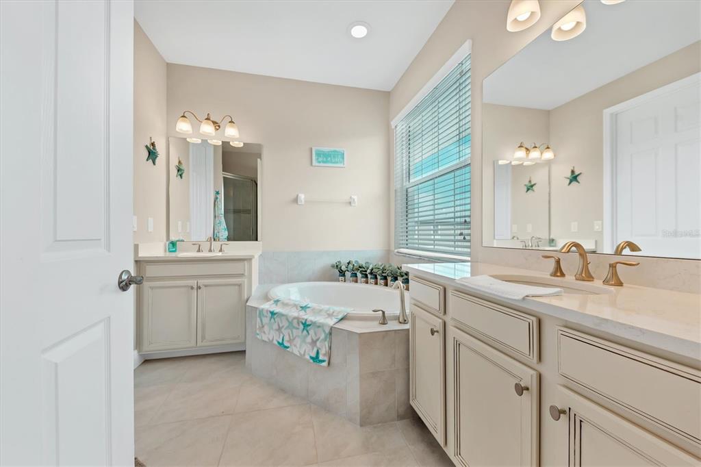 10425 Pilothouse Circle, Unit 130 Placida, FL 33946 - Photo 55 of 76 a bathroom with a sink and a mirror