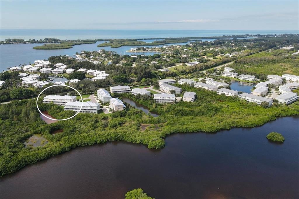 10425 Pilothouse Circle, Unit 130 Placida, FL 33946 - Photo 65 of 76 a view of a lake with outdoor space