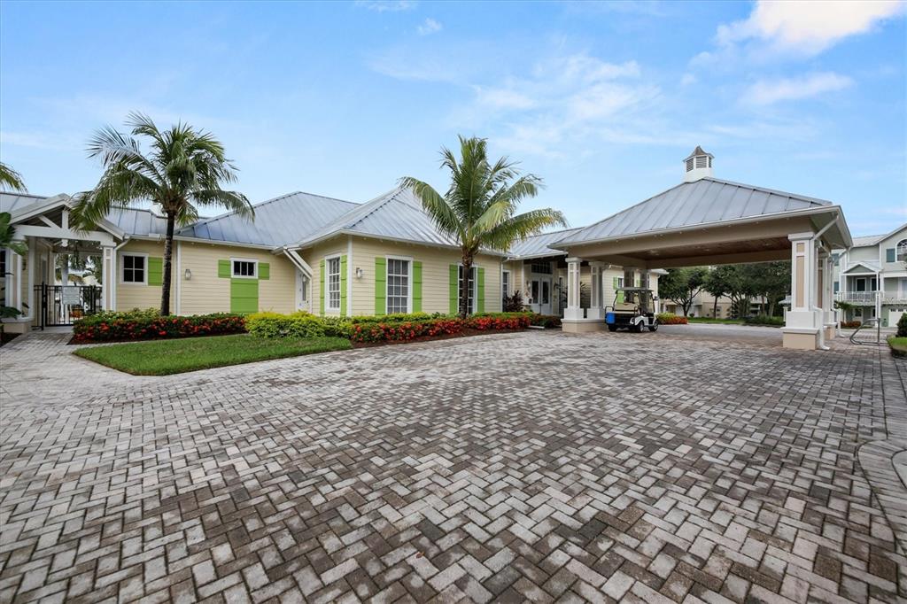 10425 Pilothouse Circle, Unit 130 Placida, FL 33946 - Photo 66 of 76 a front view of a house with a yard