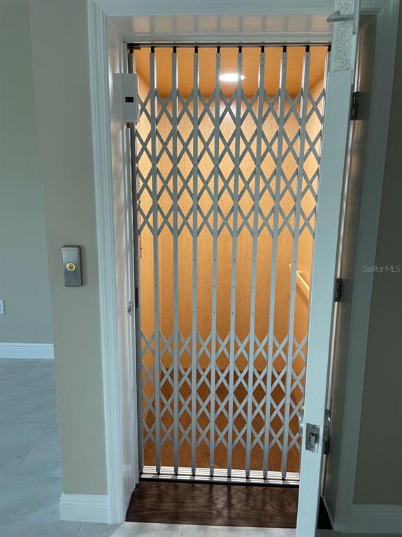 10425 Pilothouse Circle, Unit 130 Placida, FL 33946 - Photo 10 of 76 a bathroom with a sink and a shower curtain