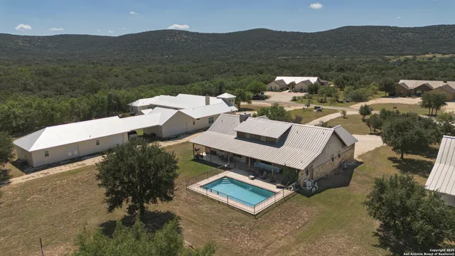 a view of a house with a mountain