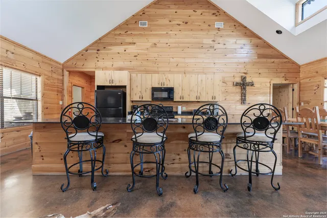 a group of chairs sitting in a living room