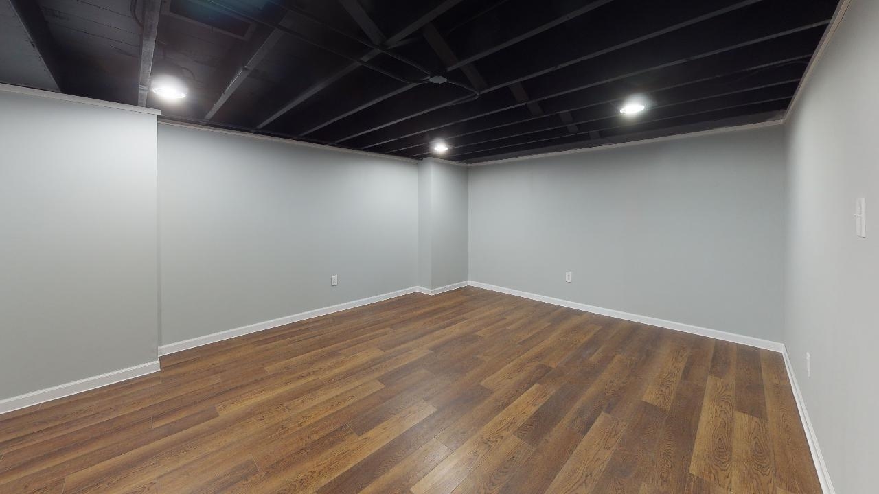 7624 Forest Avenue Munster, IN 46321 - Photo 31 of 37 a view of empty room with wooden floor