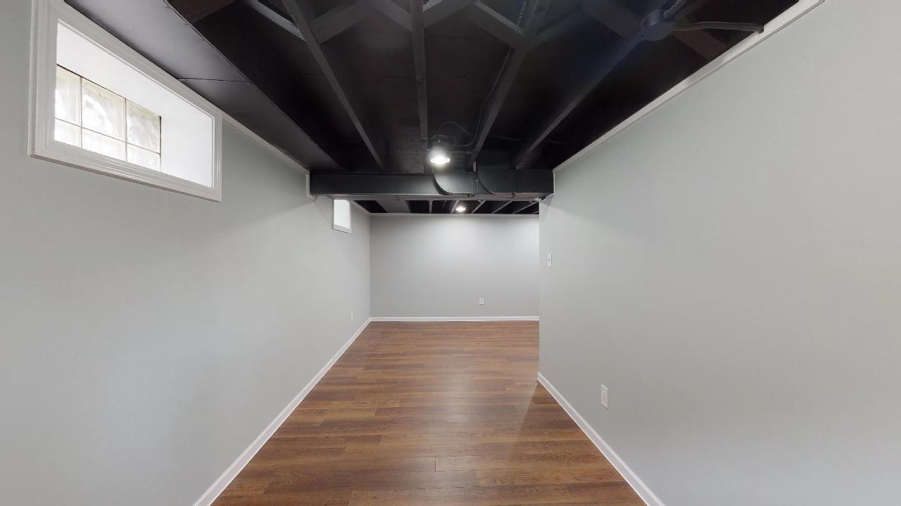 7624 Forest Avenue Munster, IN 46321 - Photo 35 of 37 a view of hallway with wooden floor