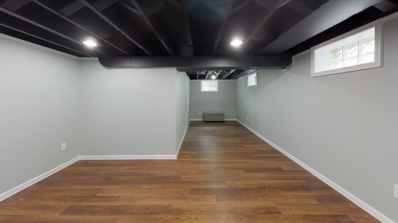 7624 Forest Avenue Munster, IN 46321 - Photo 36 of 37 a view of hallway with wooden floor