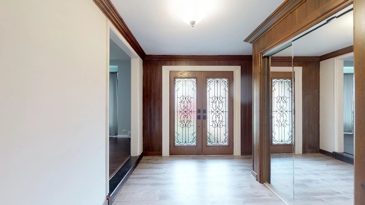 7624 Forest Avenue Munster, IN 46321 - Photo 8 of 37 a view of an entryway with a livingroom