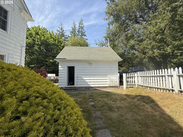 a front view of a house with a garage