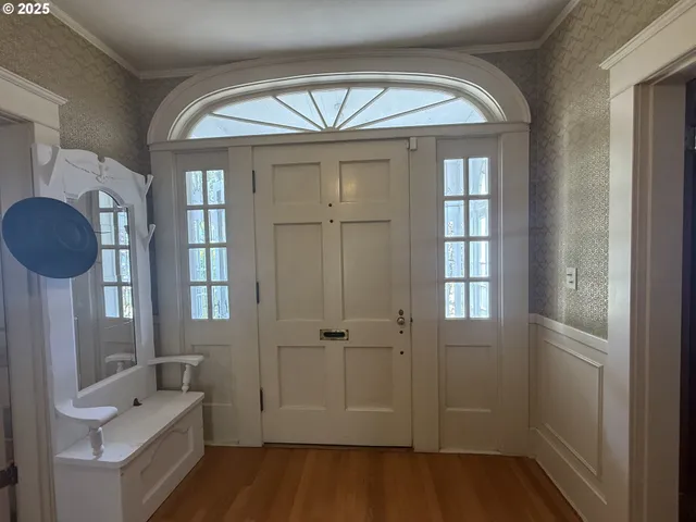a bathroom with a tub shower vanity and a sink