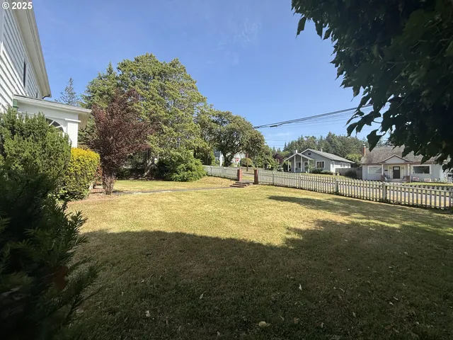 a view of an outdoor space and basketball court