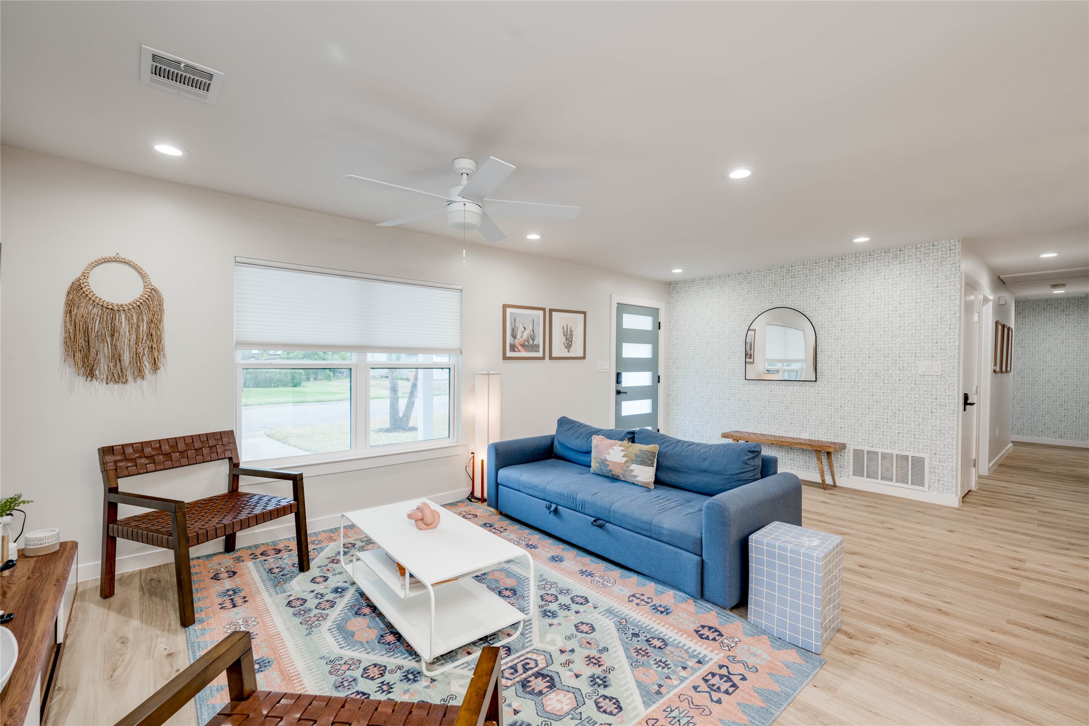 2516 Friar Tuck Lane Austin, TX 78704 - Photo 16 of 40 a living room with furniture and a wooden floor