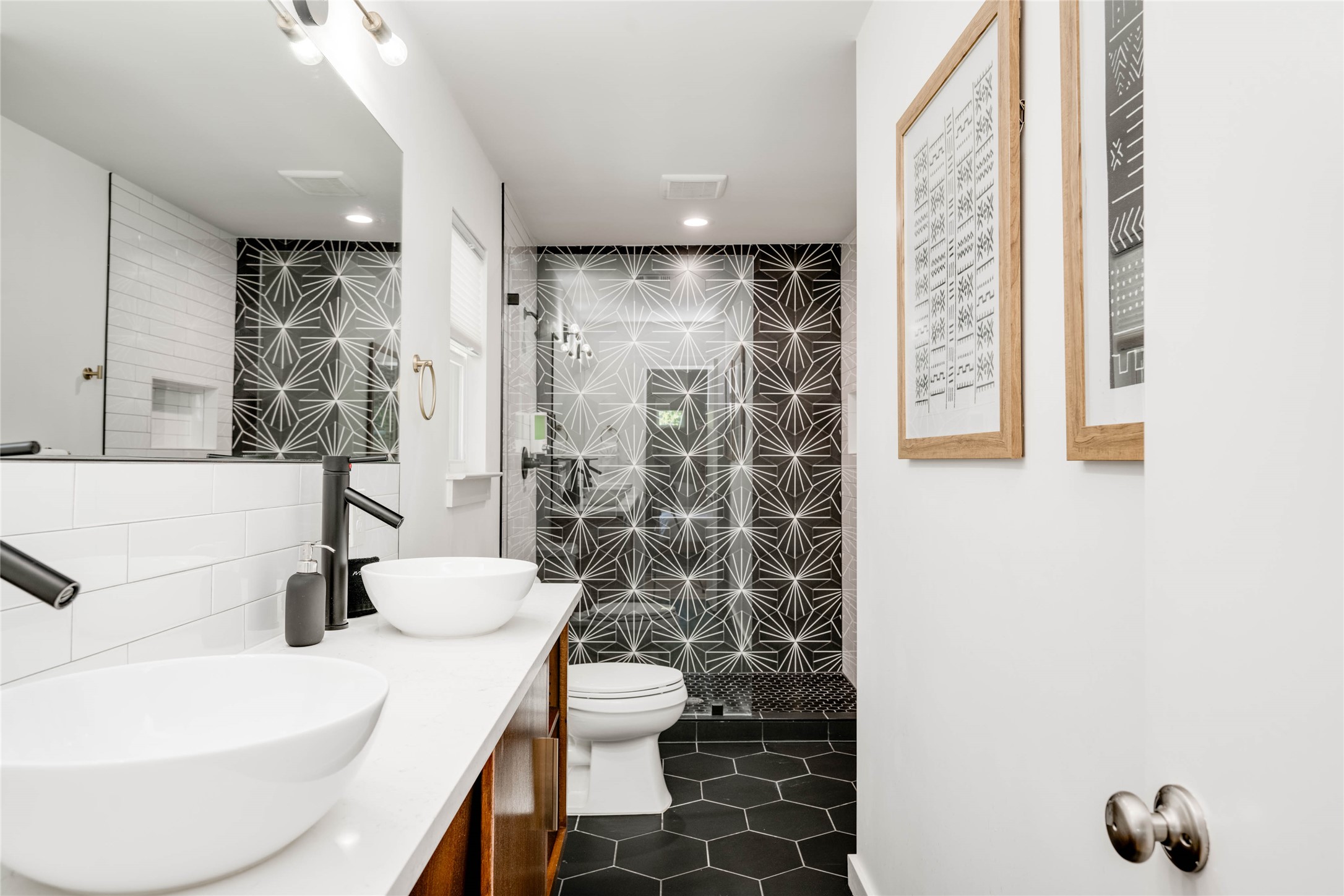 2516 Friar Tuck Lane Austin, TX 78704 - Photo 22 of 40 a bathroom with a sink toilet and shower