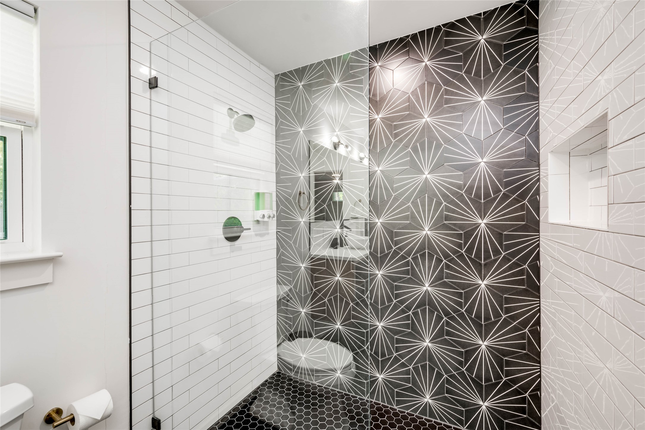 2516 Friar Tuck Lane Austin, TX 78704 - Photo 23 of 40 a bathroom with a shower and toilet