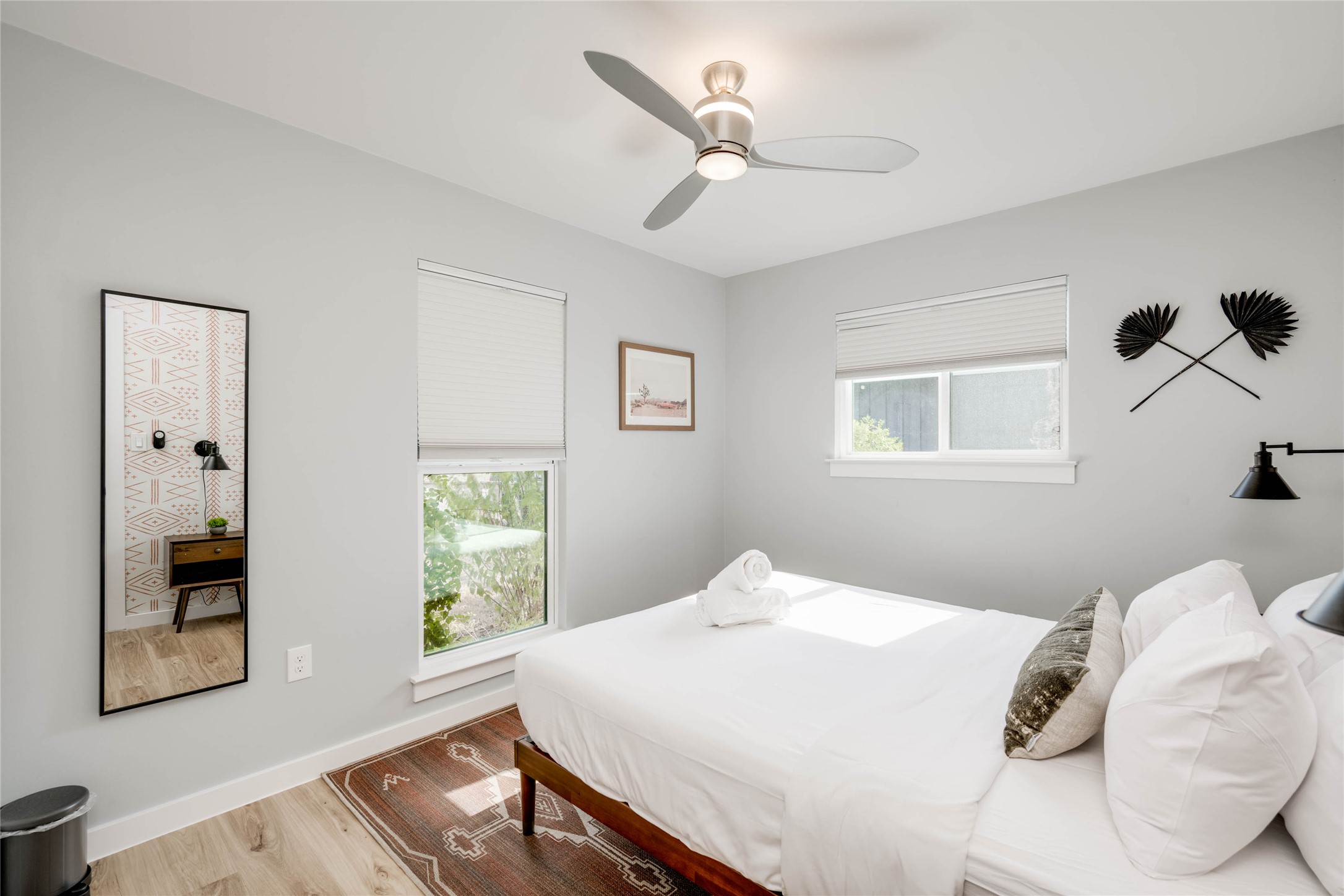 2516 Friar Tuck Lane Austin, TX 78704 - Photo 29 of 40 a bedroom with a large bed and a window