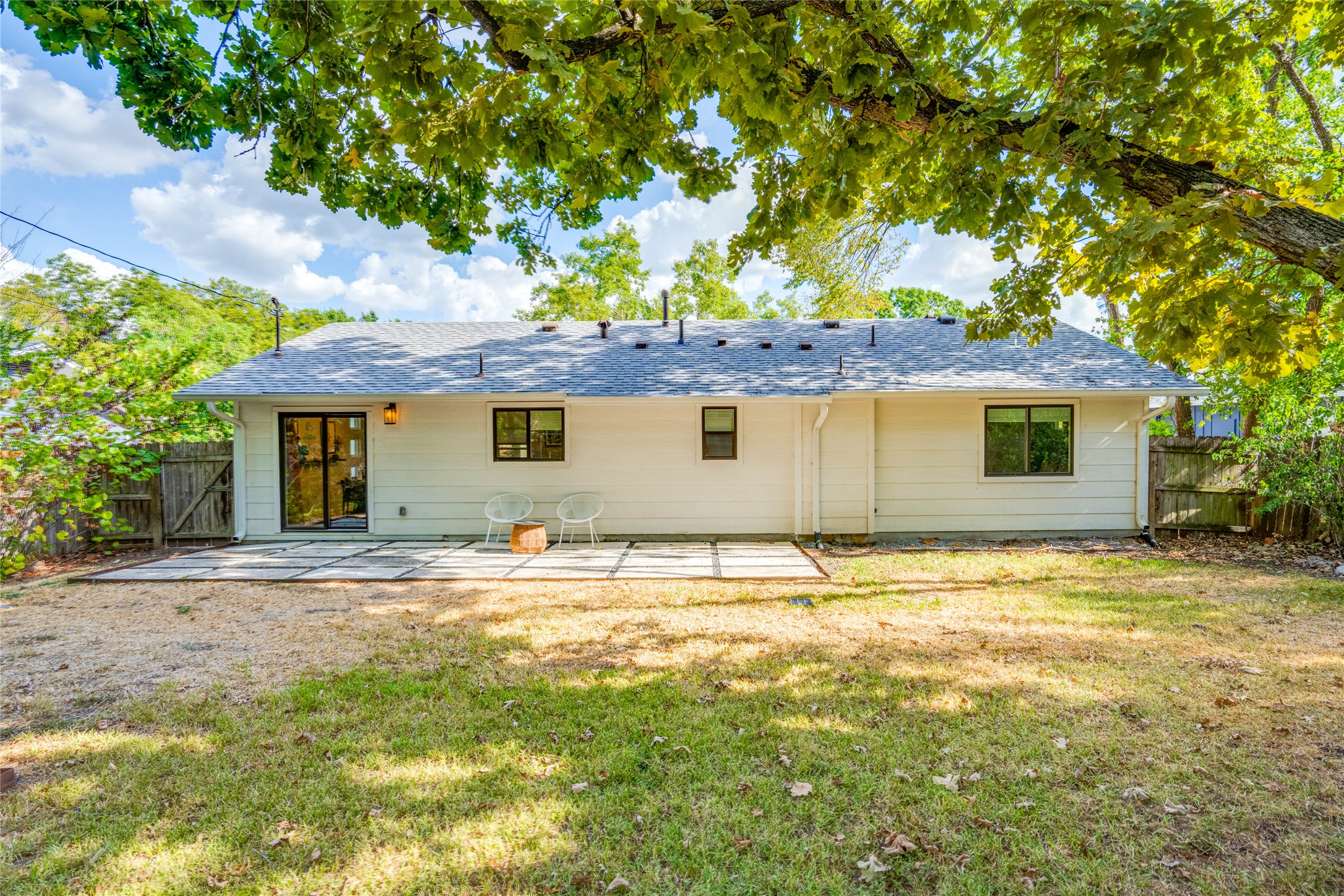 2516 Friar Tuck Lane Austin, TX 78704 - Photo 33 of 40 a view of a house with a yard and large tree