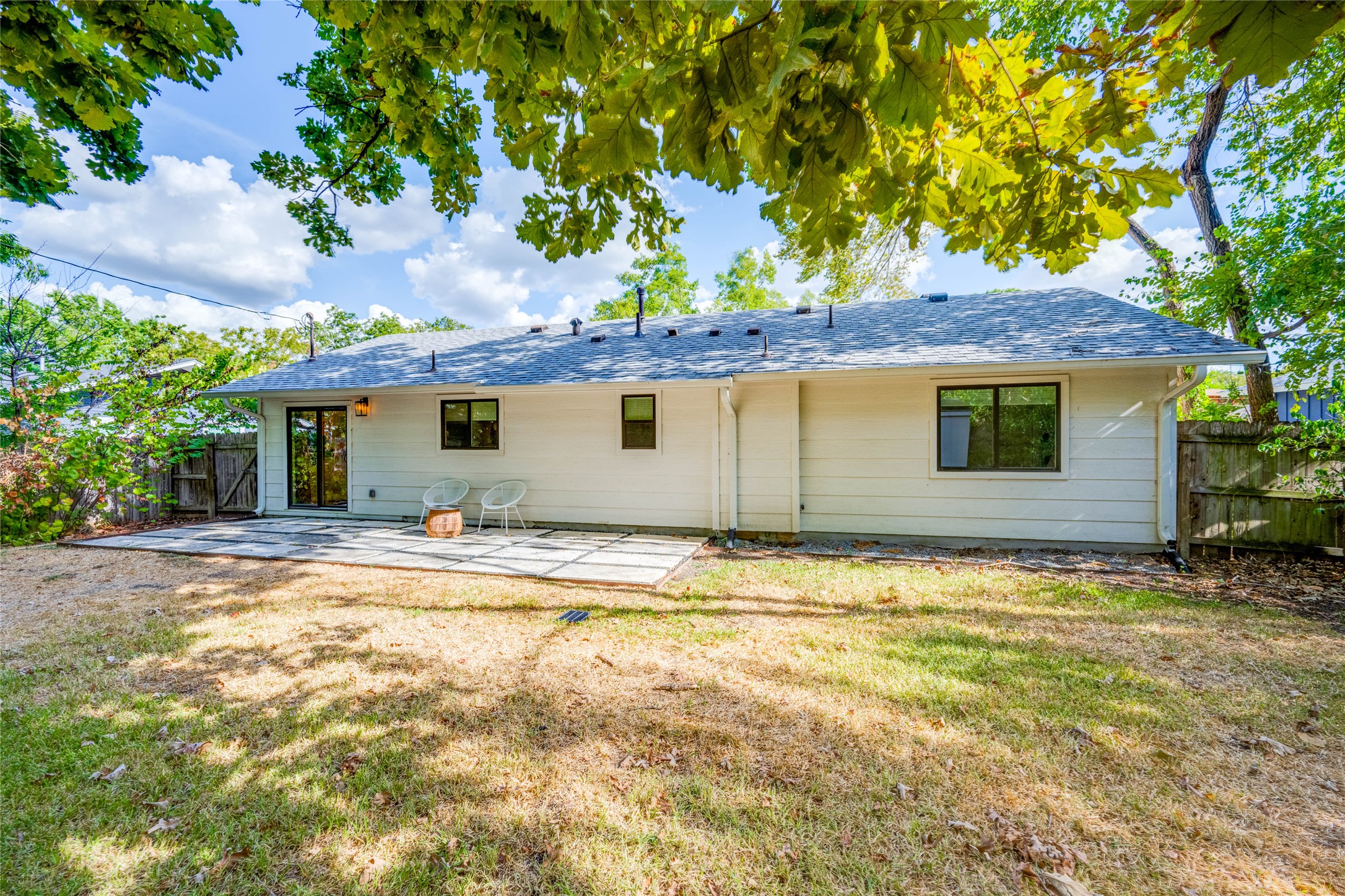 2516 Friar Tuck Lane Austin, TX 78704 - Photo 34 of 40 a front view of a house with a garden