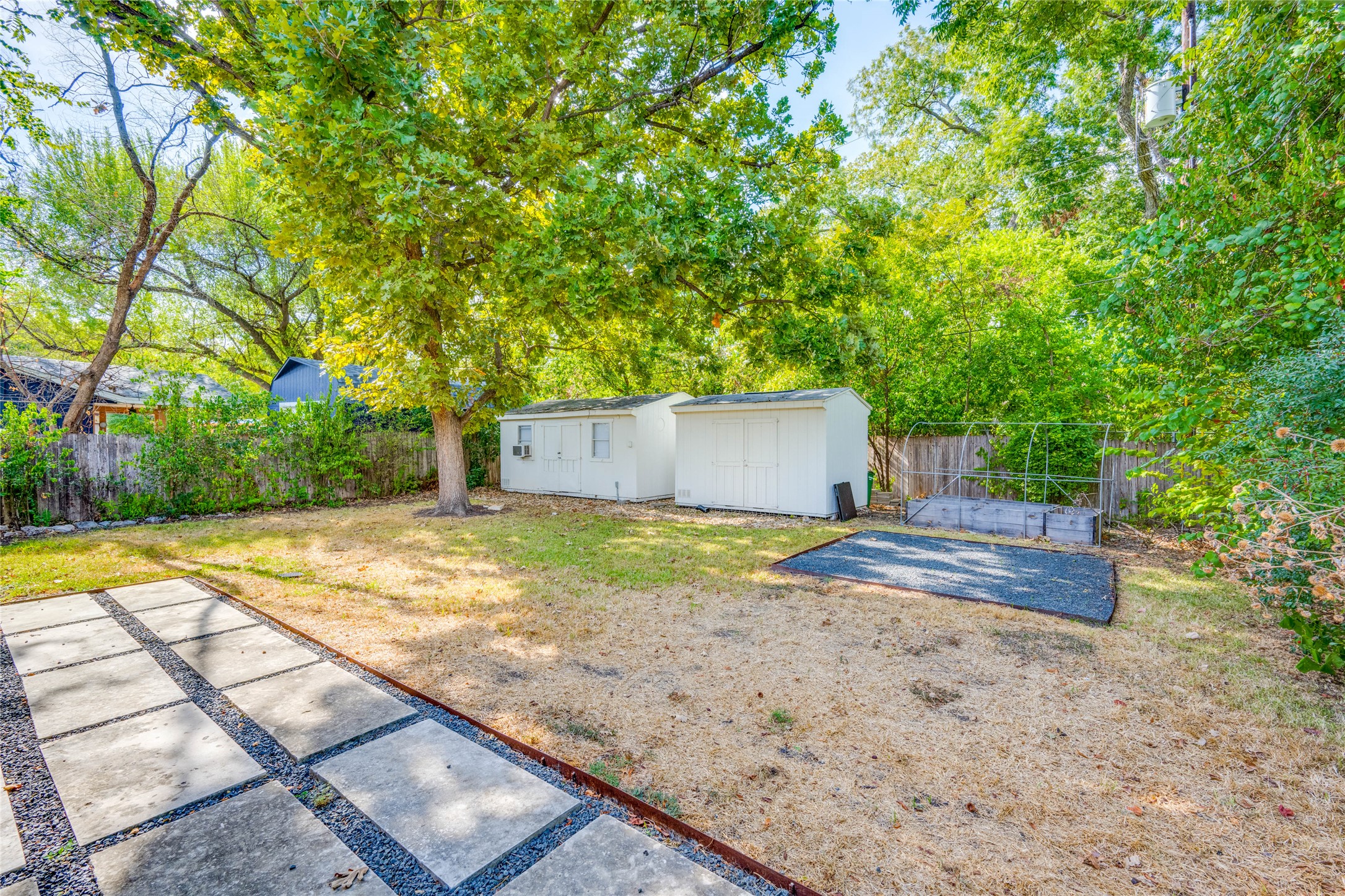 2516 Friar Tuck Lane Austin, TX 78704 - Photo 36 of 40 a view of a backyard with large trees
