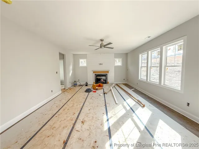 a view of a livingroom with a fireplace