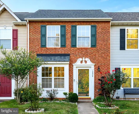 a front view of a house having yard