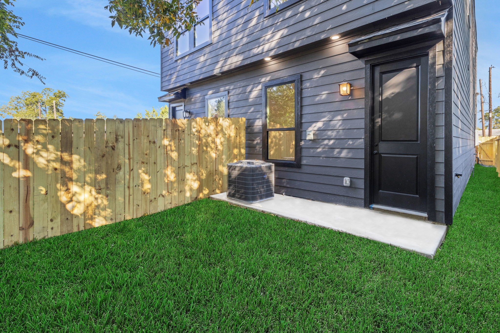 7962 Ethel Street, Unit A Houston, TX 77028 - Photo 24 of 25 a front view of a house with garden