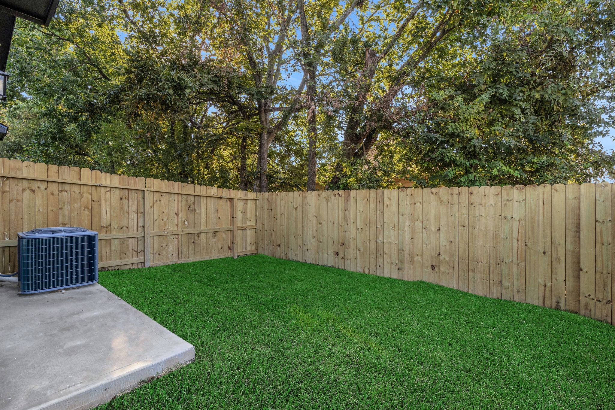 7962 Ethel Street, Unit A Houston, TX 77028 - Photo 25 of 25 a view of a backyard with wooden fence