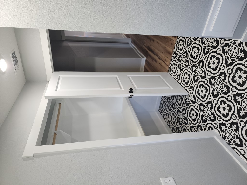 12877 East State Highway 21 Bryan, TX 77808 - Photo 21 of 48 wooden floor in a gallery