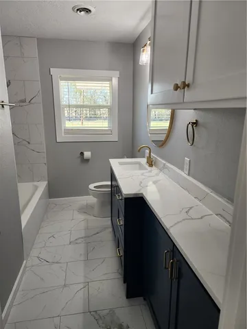 a bathroom with a bathtub