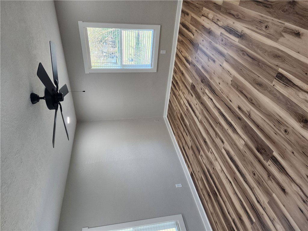 12877 East State Highway 21 Bryan, TX 77808 - Photo 34 of 48 a view of a room with a ceiling fan