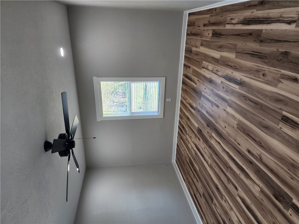 12877 East State Highway 21 Bryan, TX 77808 - Photo 35 of 48 a view of an empty room with a window