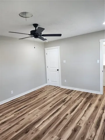 a view of staircase with white walls