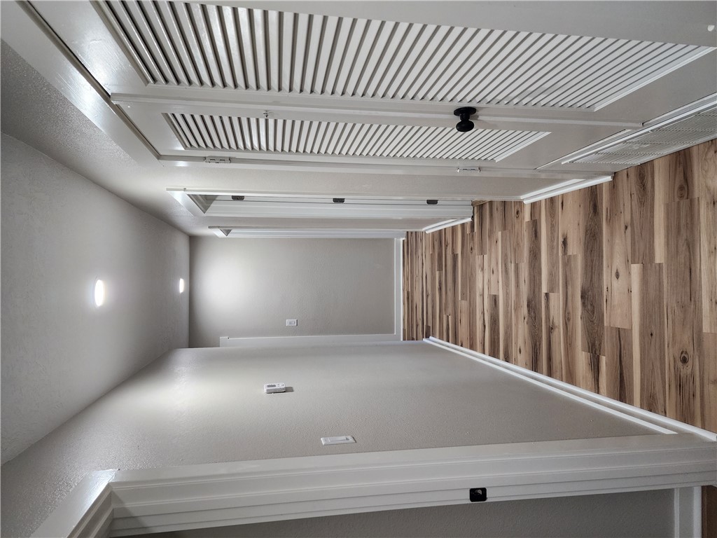 12877 East State Highway 21 Bryan, TX 77808 - Photo 38 of 48 a view of staircase with white walls