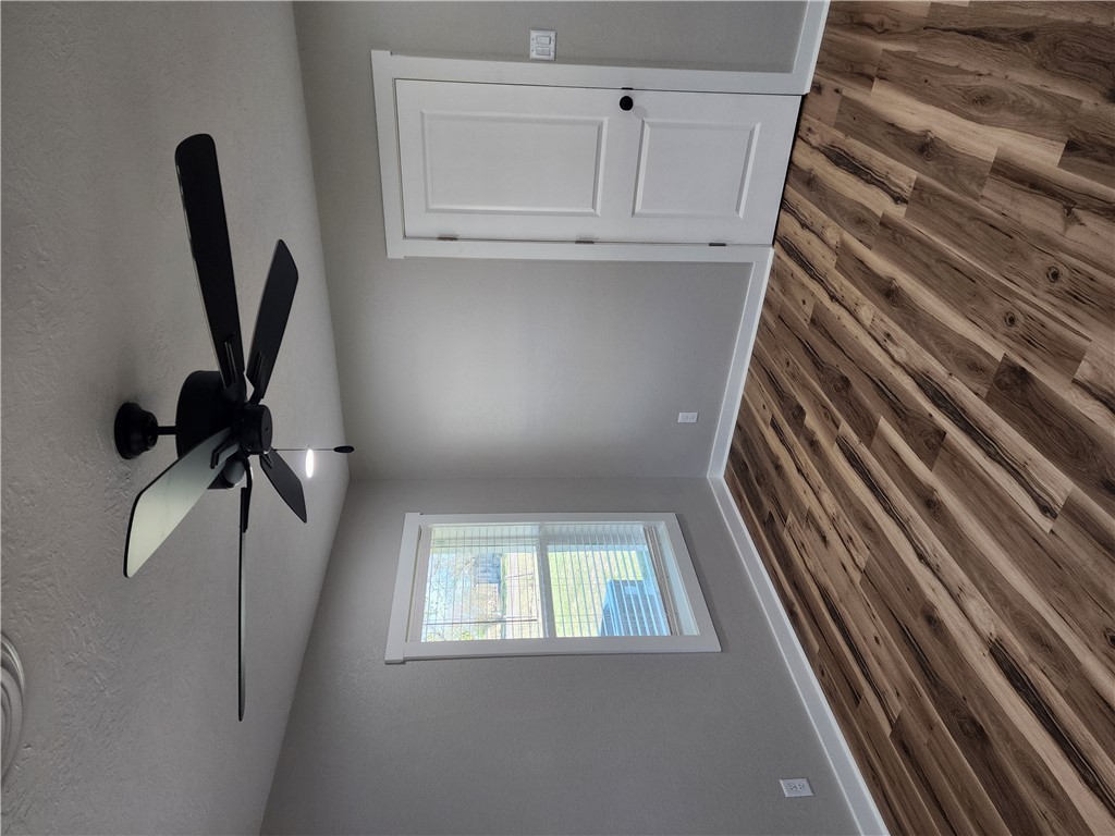 12877 East State Highway 21 Bryan, TX 77808 - Photo 4 of 48 a view of a room with a ceiling fan