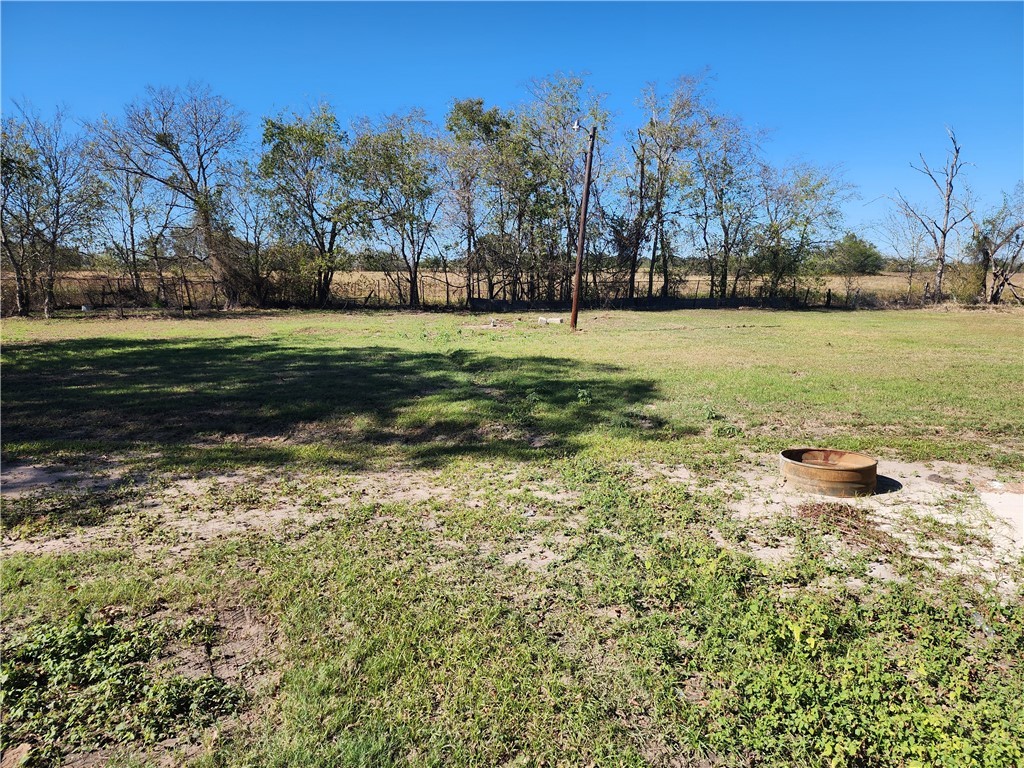 12877 East State Highway 21 Bryan, TX 77808 - Photo 46 of 48 a view of a yard with a table and chairs
