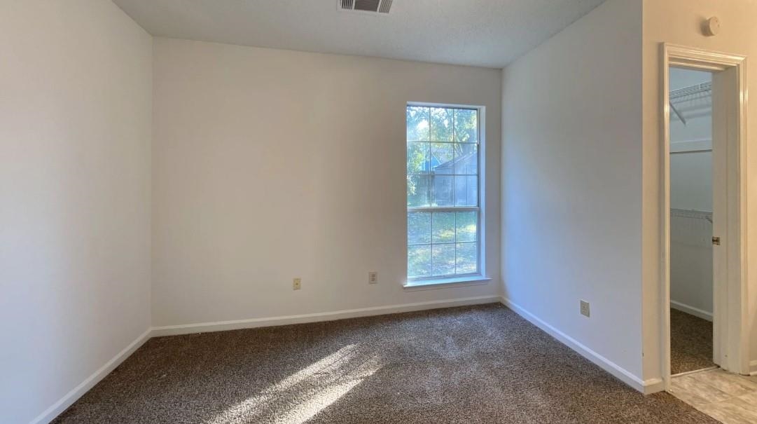 6659 Elmore Ridge Lane Memphis, TN 38134 - Photo 3 of 8 Unfurnished room with carpet